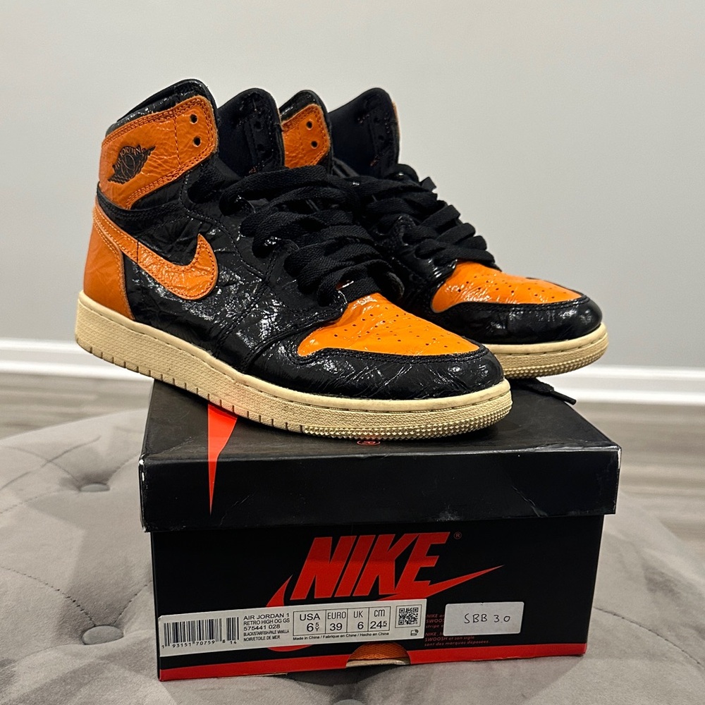 Nike Black and Orange High-Tops